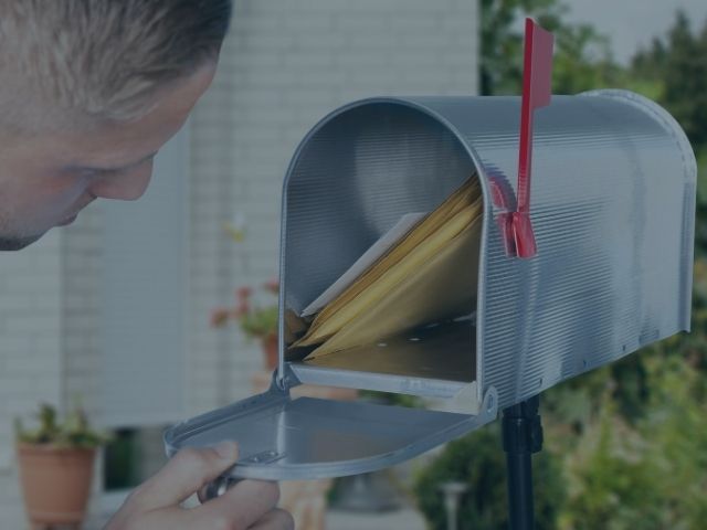 Person Opening Mail